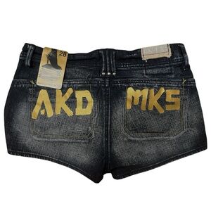SOLD Waxed/starched denim shorts with gold and silver details